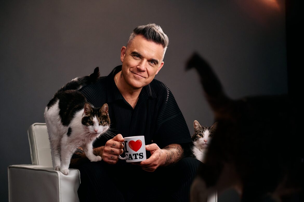 Robbie Williams “verdubbelt” Felix de kat